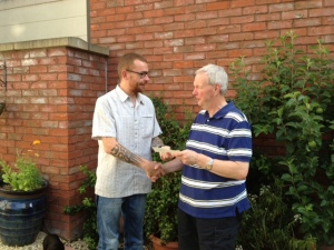Tim presents Ed with cheque for £400 for Disaster Box, the last target to be achieved in his year 2012/13